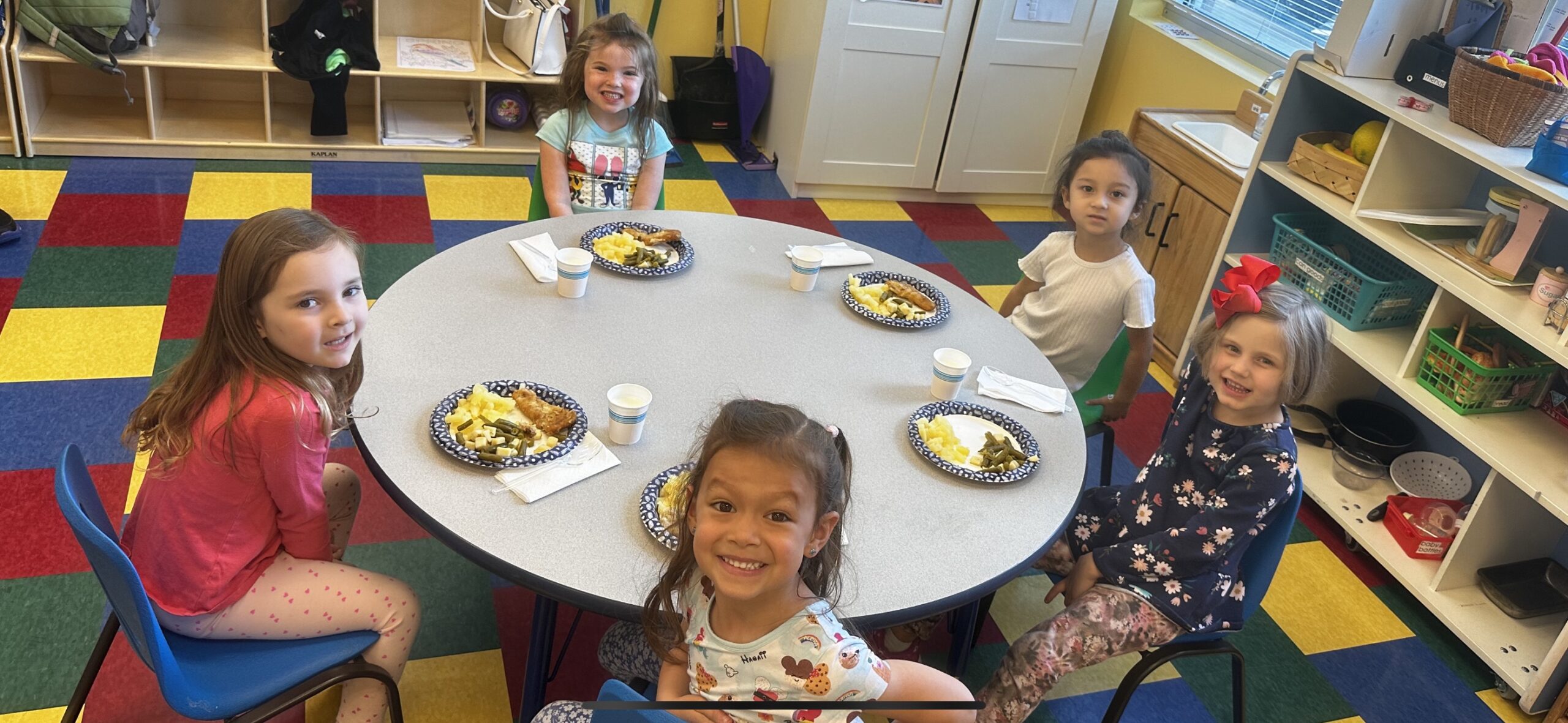 Kids at lunch at Teddy Bear Day Care and Preschool