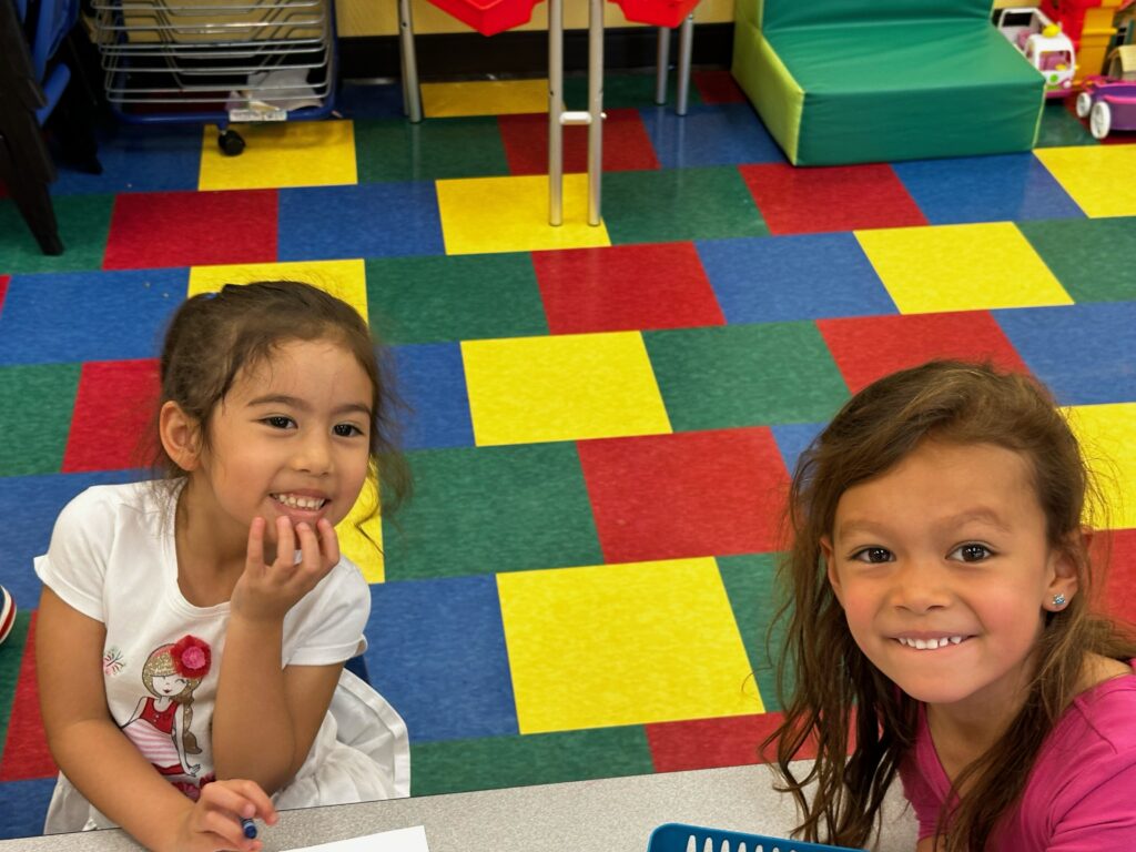 Kids coloring at Teddy Bear Day Care and Preschool